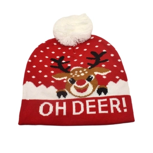 Red Christmas knit hat featuring a cartoon reindeer and Oh Deer text with white pompom