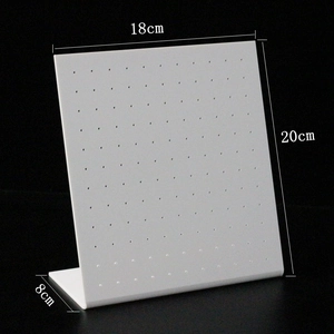 L-shaped acrylic earring display stand in white with multi-hole array, 18x20x8cm size