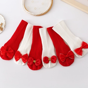 Red and white cotton rib-knit baby floor socks with bows and anti-slip dots for kids