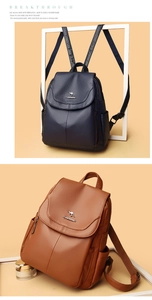 Detail of leather backpacks in navy and brown featuring embossed kangaroo logo and zipper