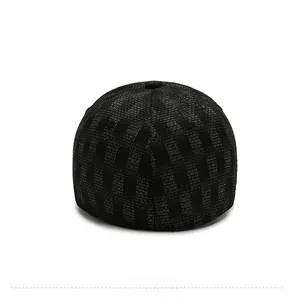 Detail view of the back of a black stretch fit sun hat with subtle grey vertical stripes