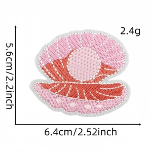 Detailed embroidery texture of shell patch with size 6.4cm x 5.6cm and weight 2.4g