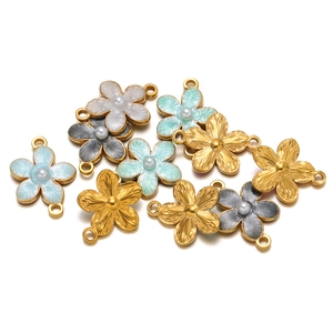 Golden flower charms with imitation pearl center and double loops for DIY jewelry
