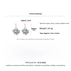 Detail view of pearl tassel earrings with dimensions and material specifications