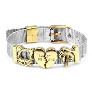 Detail of silver mesh bracelet featuring Best Friend heart and cat charms in gold finish