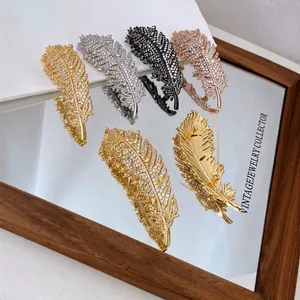 Elegant heavy zircon feather brooch in four colors with crystal pave setting