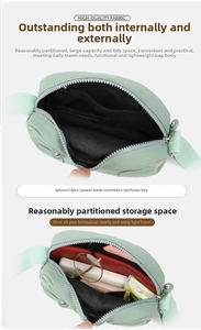 Detail view of the mint green oxford bag showing its large capacity for daily items