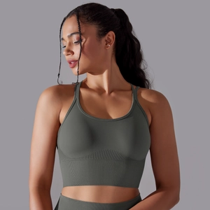 Detailed texture of seamless olive green knit fabric on high-waist sports leggings