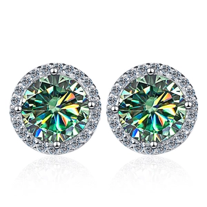 Macro detail of round cut green moissanite stud earrings in 925 silver halo setting