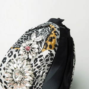 Baroque leopard print headband with crystal flower embellishments and luxury wide brim