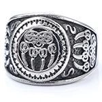 Macro shot of vintage silver viking ring with bear paw totem and celtic tribal patterns