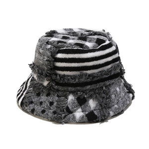 Retro geometric pattern bucket hat with frayed edges in monochrome fleece material
