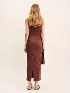 Detail view of the chocolate brown midi dress back seam and centered slit design