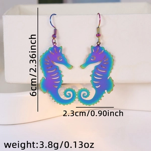 Macro view of seahorse earrings with colorful gradient laser finish and hook design