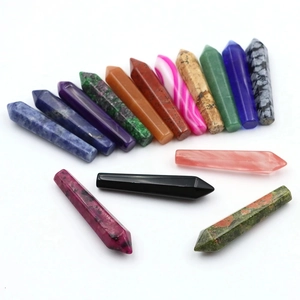 Polished natural crystal hexagonal prisms in assorted gemstones for healing and decor