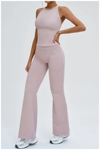 Close-up of mauve yoga set featuring racerback top and high-waisted flared pants