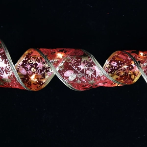 Red LED ribbon with golden stars and warm light for Christmas tree decoration