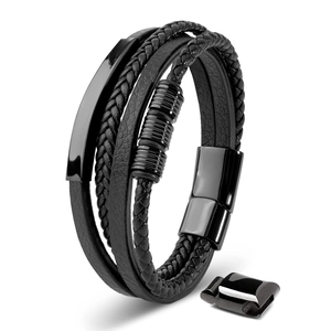 Detailed view of men's multilayer black leather bracelet with magnetic metal clasp