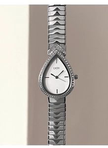 Detailed view of water-drop dial with diamond bezel and silver link strap for women