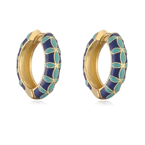 Detailed macro view of colorful blue and turquoise enamel floral earrings with gold borders