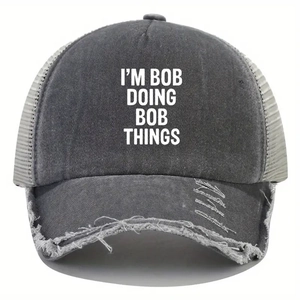 Vintage charcoal grey trucker hat with distressed brim and I'M BOB DOING BOB THINGS print