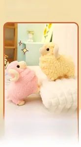 Close-up of soft plush lamb dolls in pink and beige with fluffy texture and cute horns