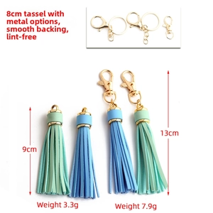 Faux leather tassel keychain set with lobster clasp and metal caps in light blue and green