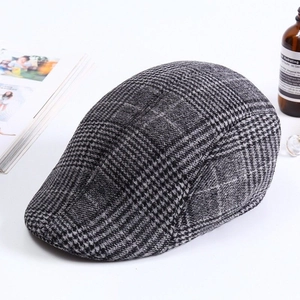Detailed top view of grey houndstooth ivy cap with premium woolen texture and retro style