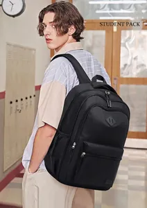 Close-up of black multi-compartment backpack with durable fabric and side mesh pocket