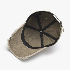 Vintage washed baseball cap in olive green with distressed brim and metal buckle