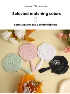 Detail of rose-shaped handheld mirror set with built-in comb in four soft pastel colors