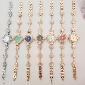 Elegant floral rhinestone link watches for women with colorful dials in a set of seven