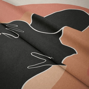 Close-up of thick geometric woven fabric showing soft texture and modern abstract patterns