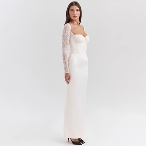 Detail of elegant white lace long sleeve bodice and sleek satin mermaid skirt dress