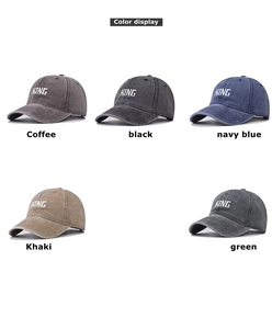 Color display of washed cotton baseball caps with KING embroidery in five vintage tones