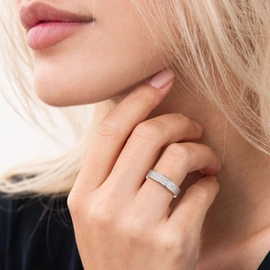 Elegant 925 sterling silver moissanite ring with three rows of pavé set sparkling diamonds