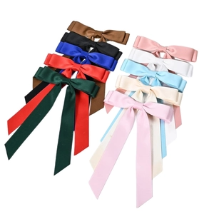 Set of 10 colorful satin ballet bow hair clips with long ribbons for elegant hairstyles
