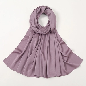 Elegant dusty rose silk-like satin hijab shawl with a textured pleat and soft drape