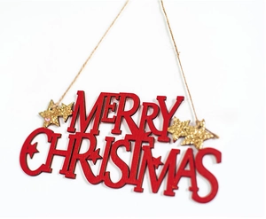 Detail of red Merry Christmas wooden hanging ornament with gold glitter star and rope