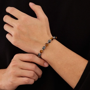 Titanium steel bracelet with natural tiger eye and hematite beads on male wrist