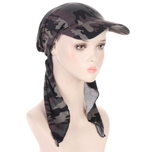Detail view of camouflage sun hat with neck flap and brim on a professional mannequin