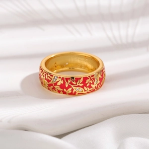 Vintage wide gold ring with red enamel finish and floral vine pattern with white stones
