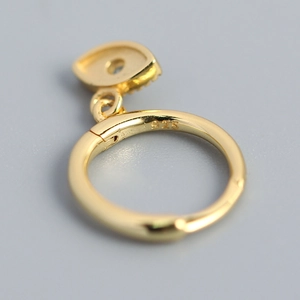 Gold s925 silver earring with geometric evil eye charm and sparkling diamond accents