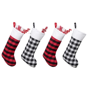 Set of 4 Christmas stockings with red and black buffalo plaid and plush white cuffs