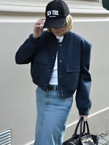 Women's dark blue stand collar jacket with large pockets and ribbed cuffs in street style