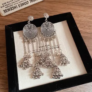 Vintage silver tassel earrings with ethnic jhumka bells in a premium display box