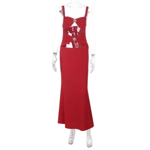 Detail of red fish-tail maxi dress with cutout design and sunburst rhinestone buckles