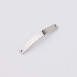 Detailed view of a curved stainless steel connector with double holes for DIY jewelry