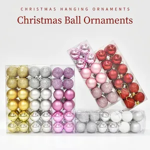 Assorted Christmas hanging ornaments in vibrant colors and textures in a clear box set