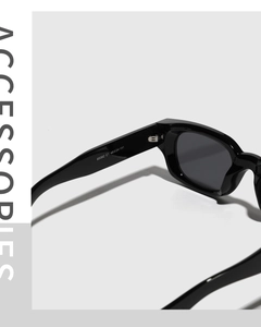 Detail of metal hinge and engraved model 95392 on black cat-eye sunglasses frame